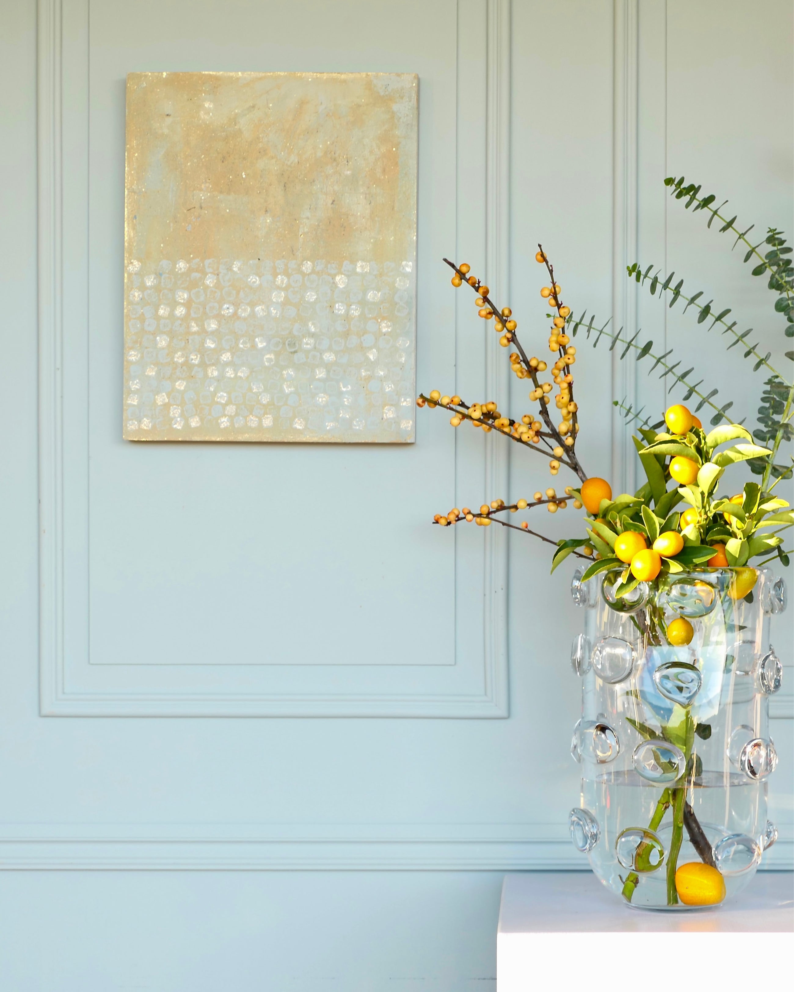 Abstract patina artwork with gold details on wood panel, displayed on wall, Little Treasures series