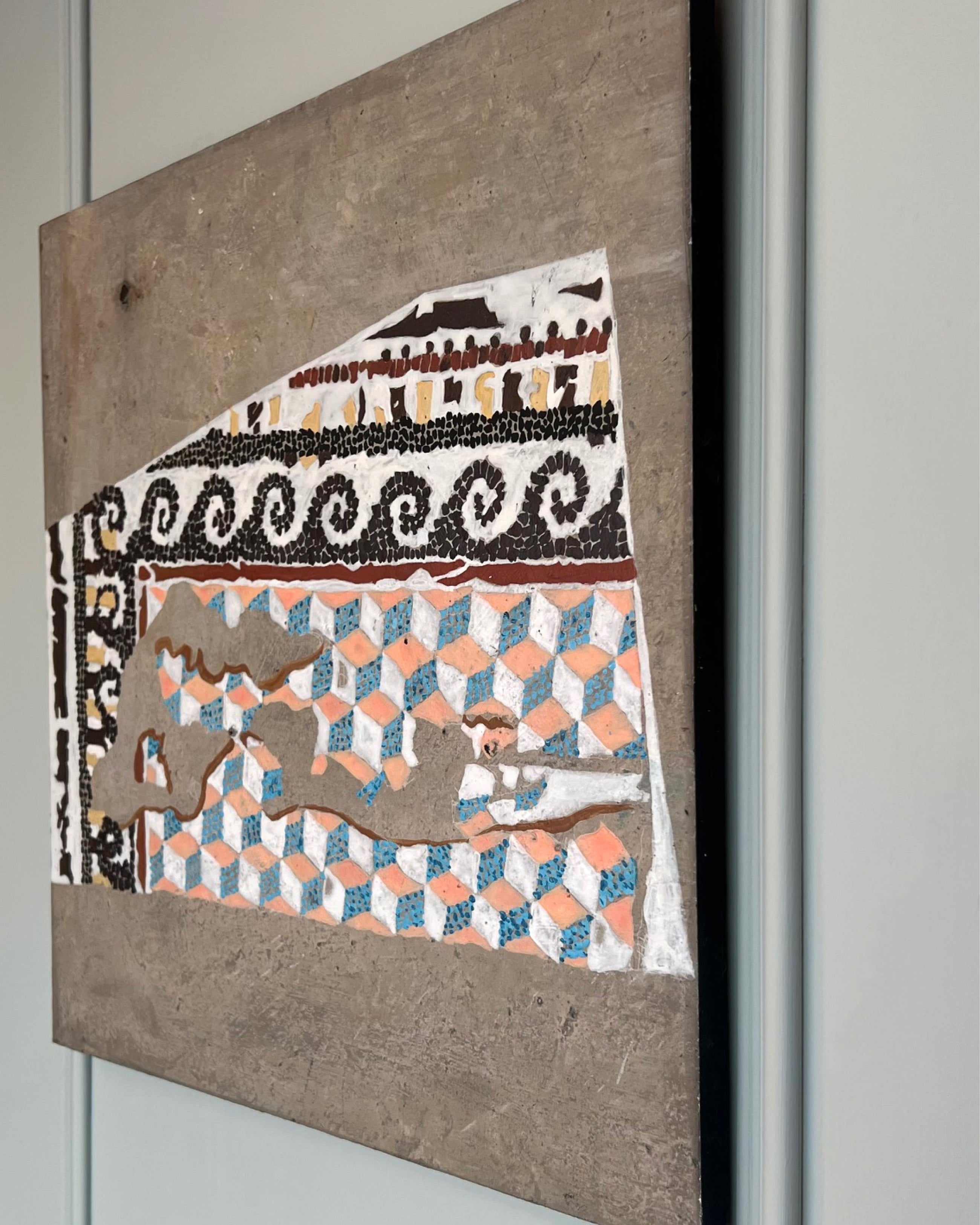 Close-up of modern mosaic artwork with irregular geometry, erosion-inspired structure and muted tones