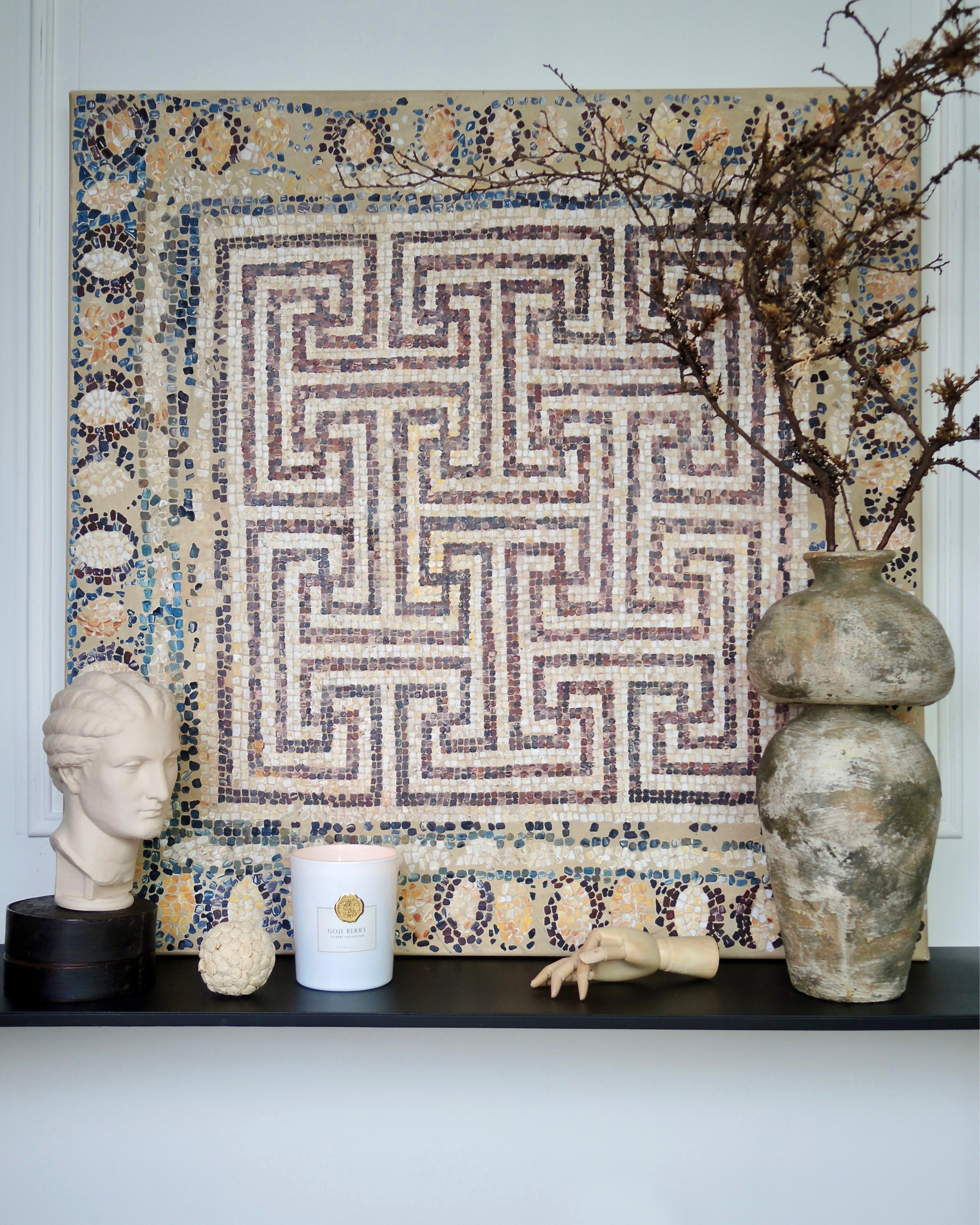 Mosaic artworks inspired by ancient patterns.