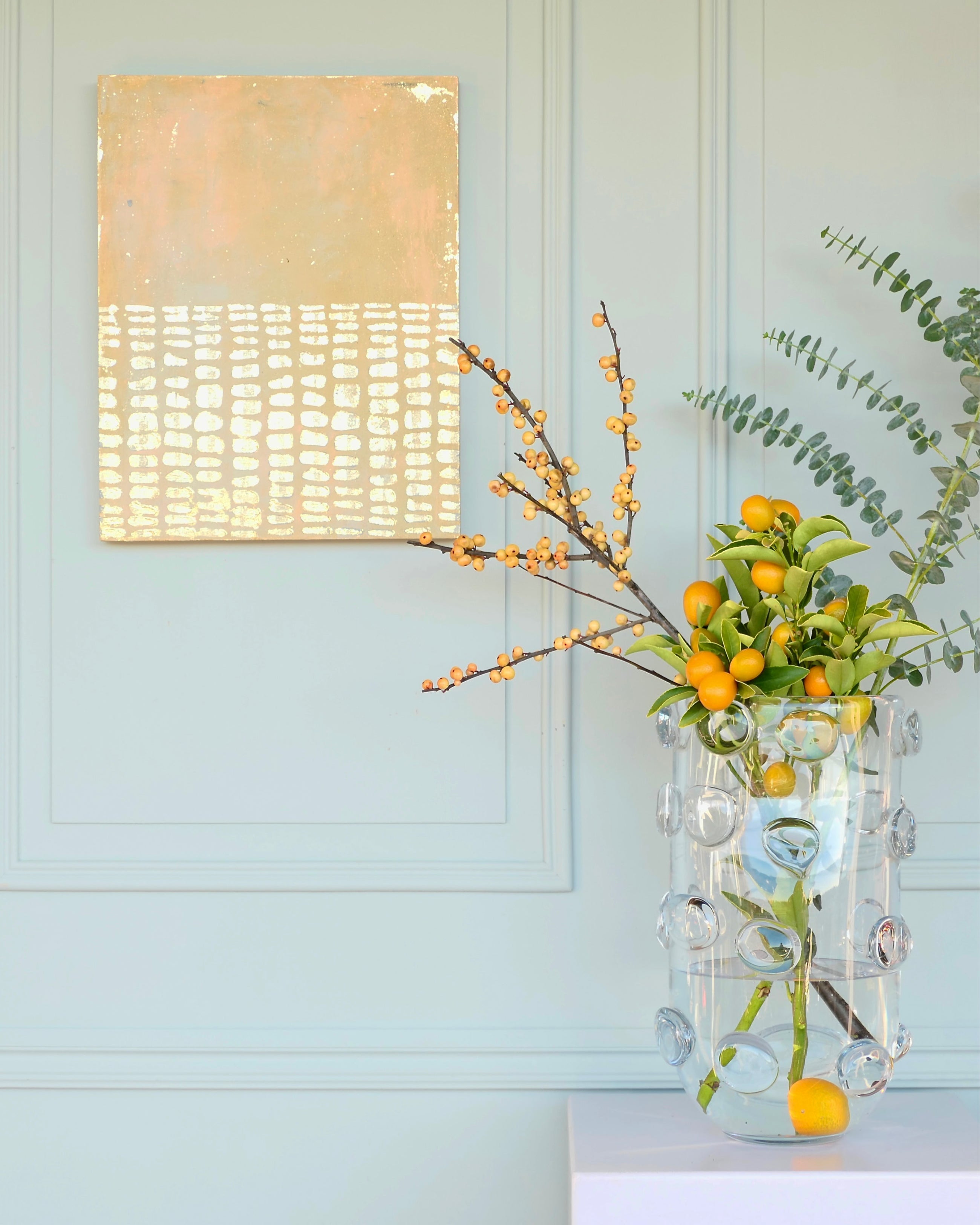 Abstract patina artwork with gold details on wood panel, displayed on wall, Little Treasures series
