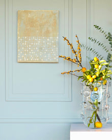 Abstract patina artwork with gold details on wood panel, displayed on wall, Little Treasures series
