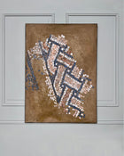 Abstract mosaic-inspired painting on canvas with suspended tessera-like elements in blue, off-white and warm earth tones.