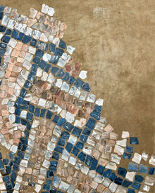 Close-up of abstract mosaic painting showing hand-painted square elements and mineral surface texture.