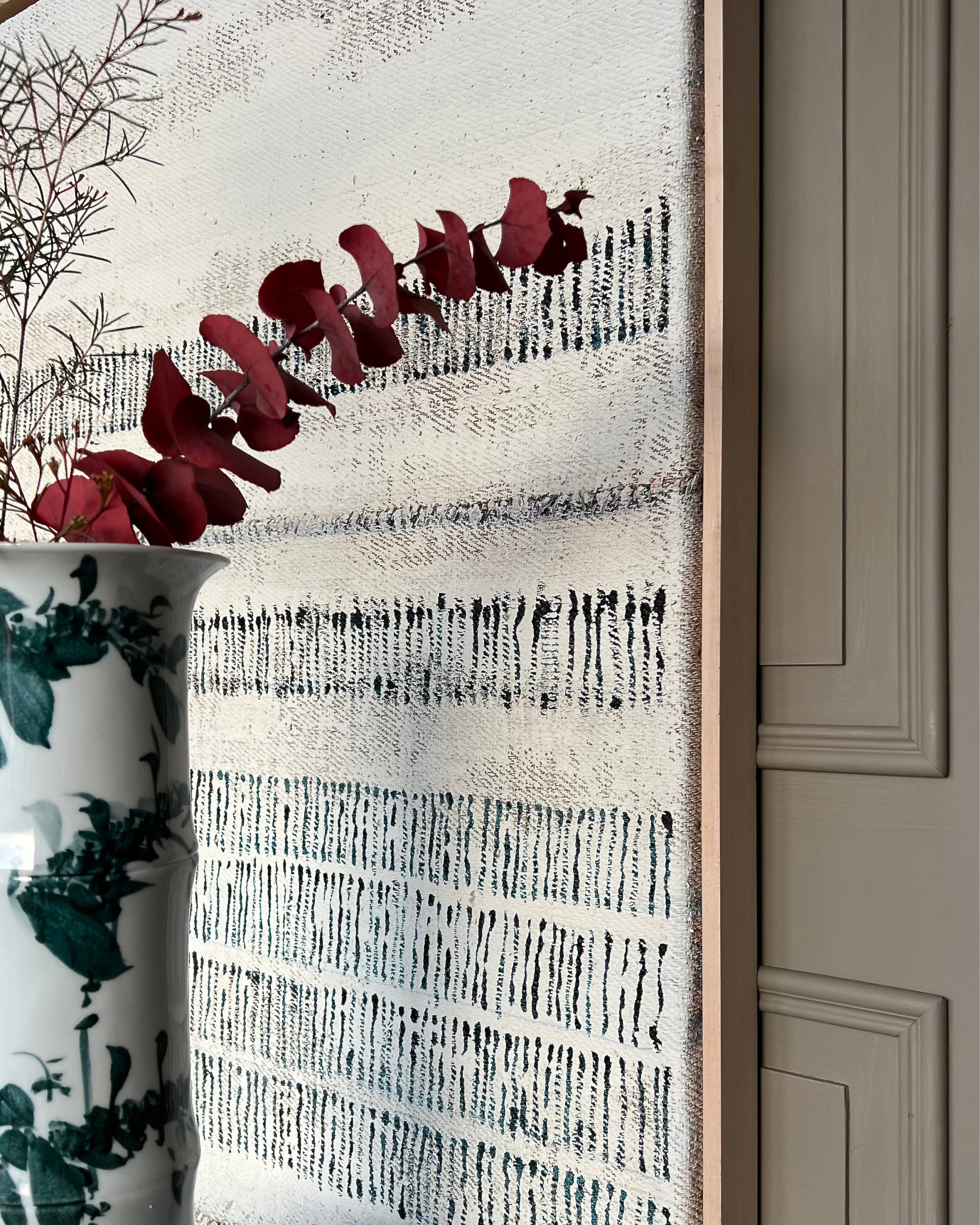 Side view of original abstract painting on burlap mounted on canvas, shadow gap frame emphasizing depth and materiality