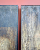 Detail of layered egg tempera and ash creating a textured patina surface in abstract painting